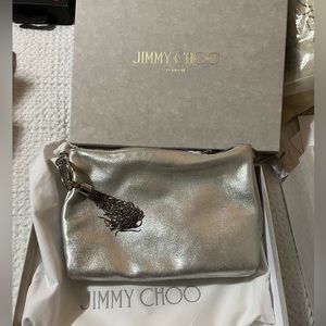 JIMMY CHOO Callie 
Silver Metallic Leather Clutch Bag